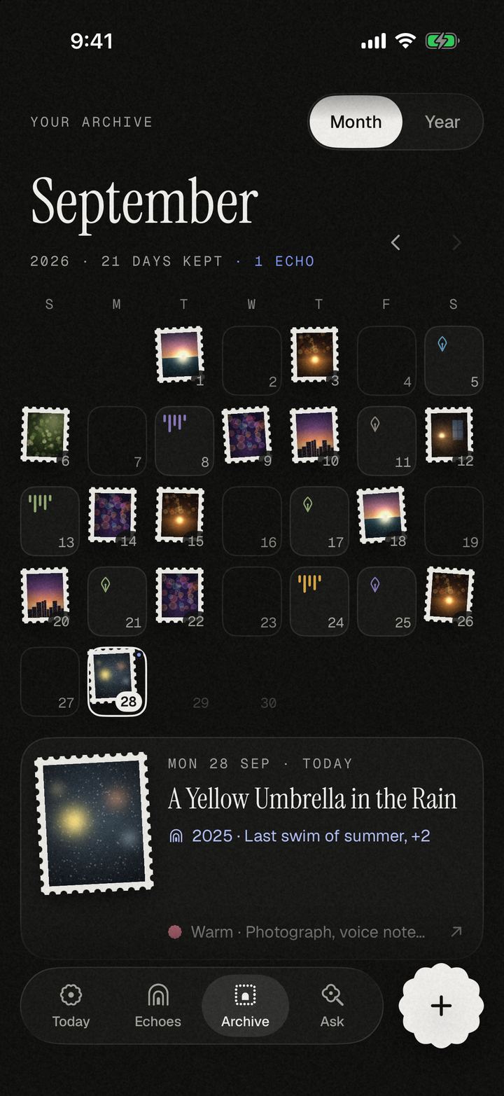 The Archive in Month view: September 2026 as a calendar of postage stamps, photos and small voice and ink tiles, with the 28th selected: “A Yellow Umbrella in the Rain”.